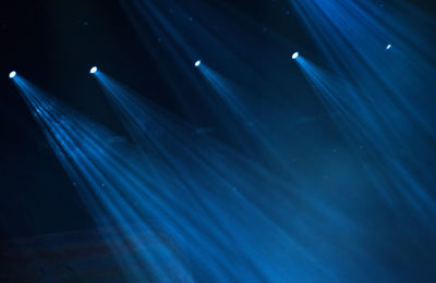 Light painting against blue sky at night