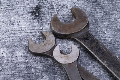 High angle view of keys on wooden table