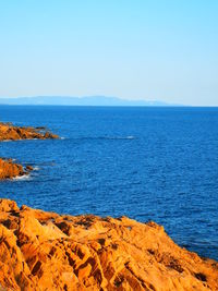 Scenic view of sea against clear sky