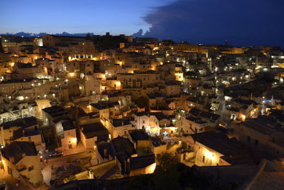 High angle view of illuminated townscape against sky