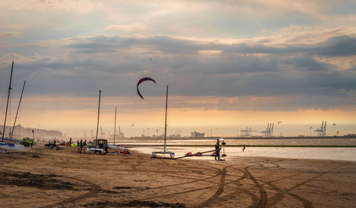 Scenic view of beach against sky during sunset