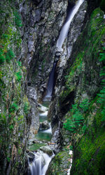 High angle view of waterfall in forest
