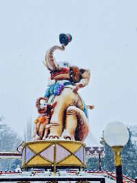 Elephant statue covered with snow at lunapark