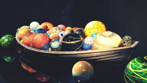 Close-up of multi colored easter in artificial boat
