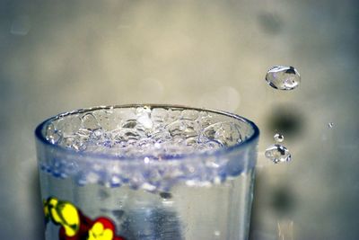 Close-up of glass of water on table