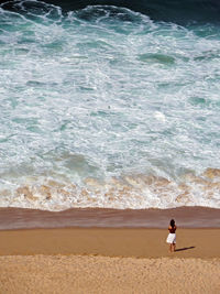 Man standing on beach