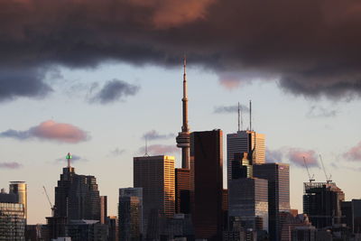 Skyscrapers in city against sky