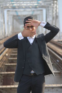 Man wearing sunglasses standing outdoors