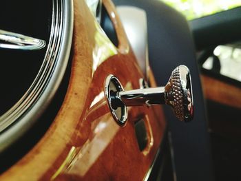 Close-up of car on road