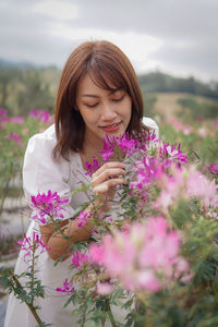 Young woman with flowers