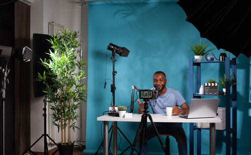 Midsection of man working at home