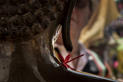 Close-up of cross in temple