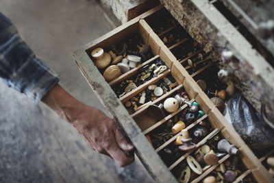 High angle view of man working on wood