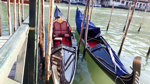 Boats moored in canal