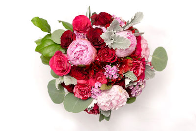 Close-up of rose bouquet against white background