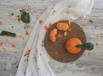 High angle view of orange fruits on table