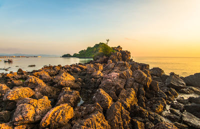 Scenic view of sea against sky during sunset