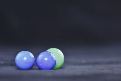 Close-up of marbles on table