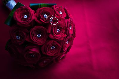 High angle view of red rose on table