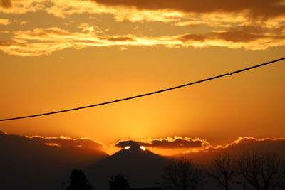 Scenic view of dramatic sky during sunset