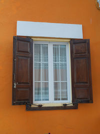 Closed door of orange building