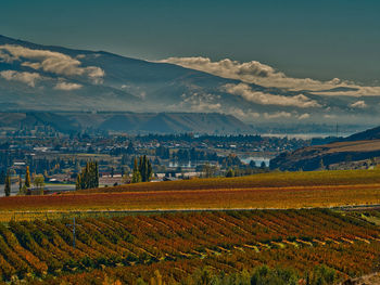 Scenic autumn view of field against sky