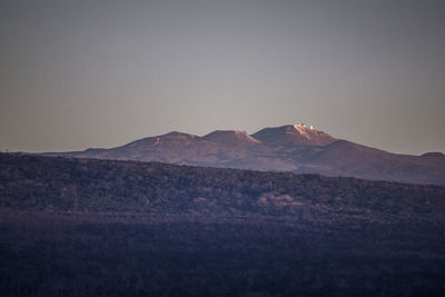 Scenic view of mountains against clear sky