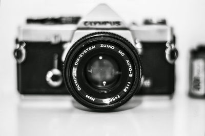 Close-up of camera on table