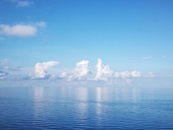 Scenic view of swimming pool by sea against sky