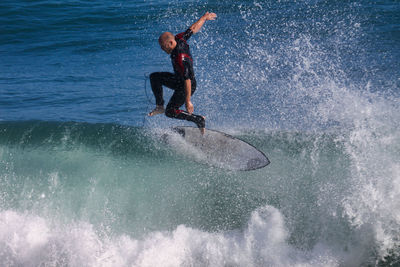 Man surfing in sea