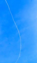 Low angle view of vapor trail in sky