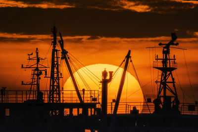 Silhouette of electricity pylon