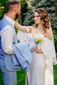 Happy couple standing on outdoors