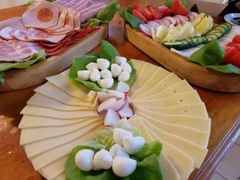 High angle view of chopped fruits on table