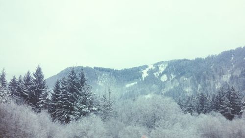 Scenic view of snow covered mountains