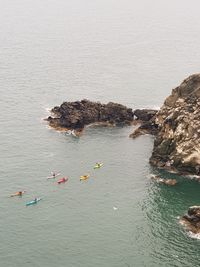 High angle view of rocks in sea