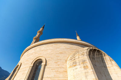 Large dome of a mosque with minarets