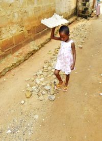 Full length rear view of woman walking