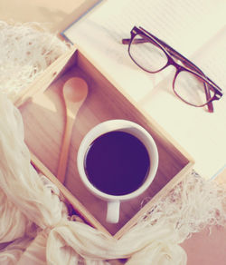 High angle view of coffee cup on table