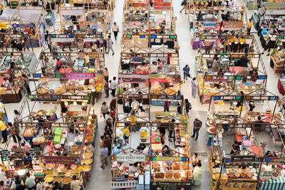 Group of people at market stall