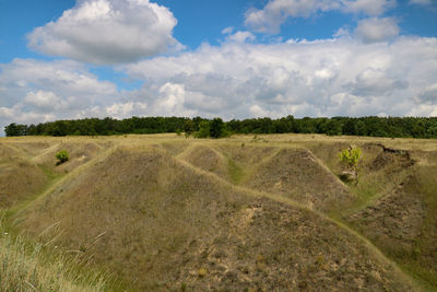 Scenic view of land against sky