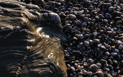 High angle view of stones at beach