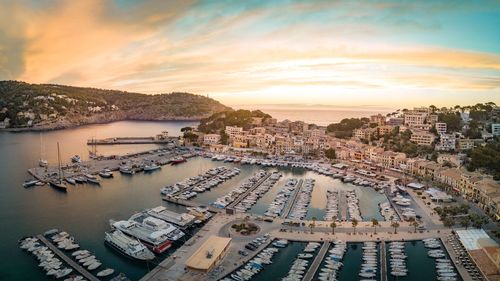 High angle view of commercial dock against sky during sunset