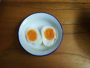 High angle view of boiled egg in bowl on table