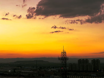 High angle view of cityscape against sky during sunset