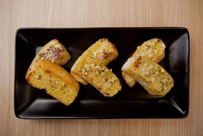 High angle view of meat in plate on table