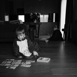 Children playing on table at home