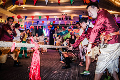 High angle view of people dancing at night