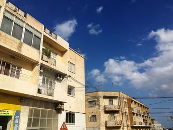 Exterior of buildings against blue sky