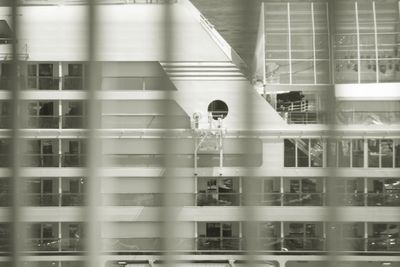 Reflection of building on glass window